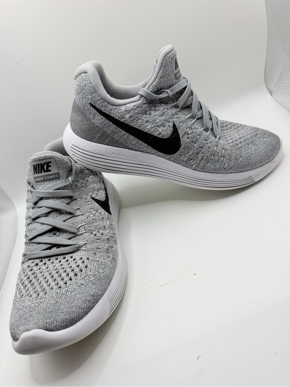 Nike Light Grey Knit Running Shoes with Black Swoosh